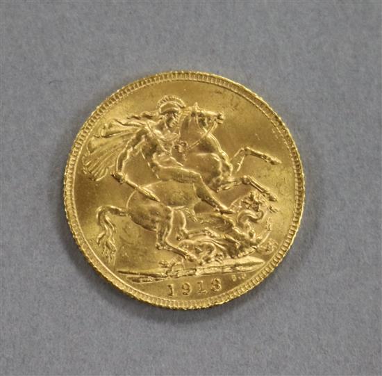 A George V 1913 gold full sovereign.